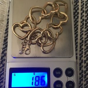 Heart shaped stamped 10k gold tone bracelet